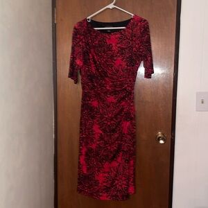 Midi red wrap around looking dress.